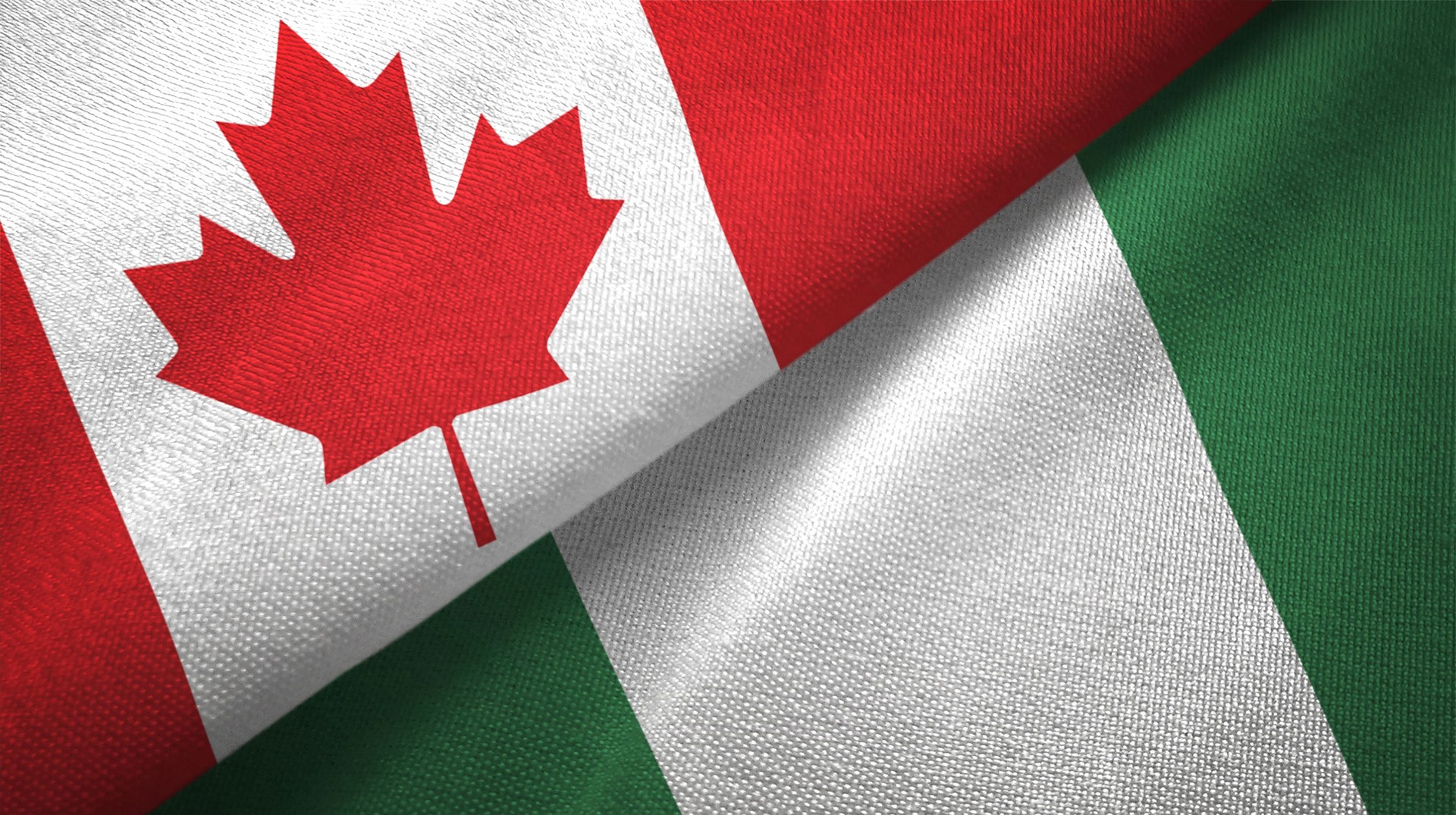Nigeria and Canada two flags together realations textile cloth fabric texture